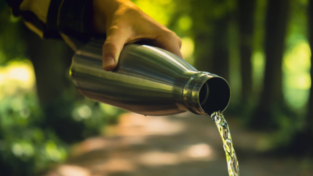 Close-up of female hand holding Water bottle